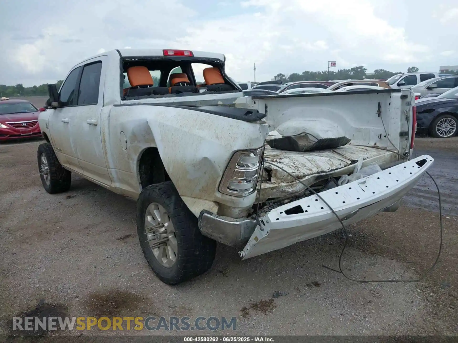 3 Photograph of a damaged car 3C6UR5DLXMG516948 RAM 2500 2021