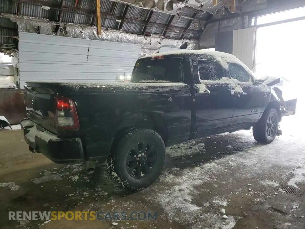 3 Photograph of a damaged car 3C6UR5DLXMG580648 RAM 2500 2021