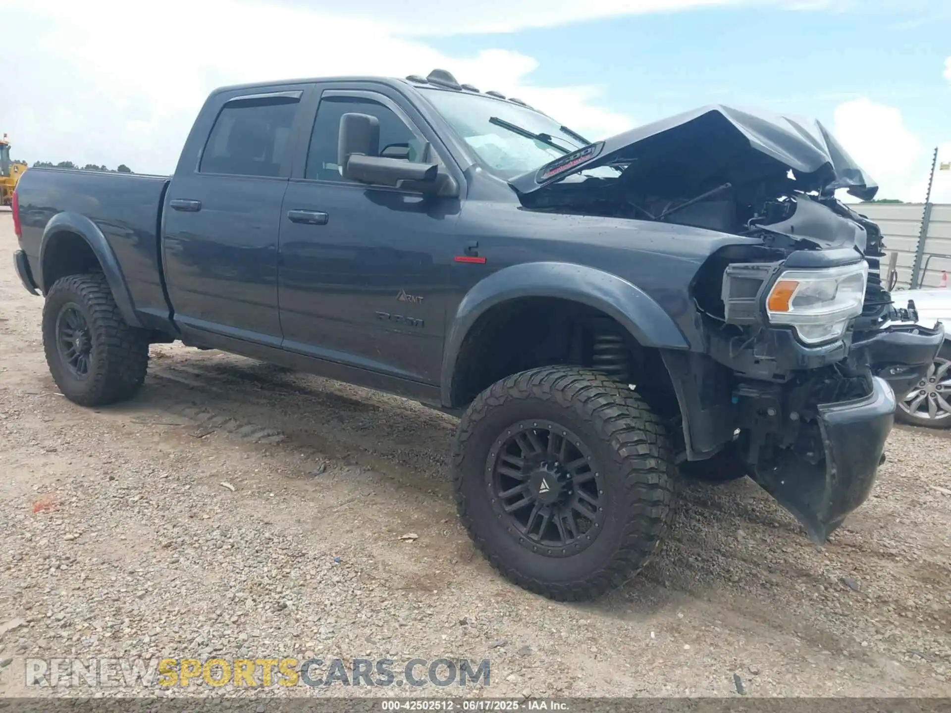 1 Photograph of a damaged car 3C6UR5DLXMG659821 RAM 2500 2021