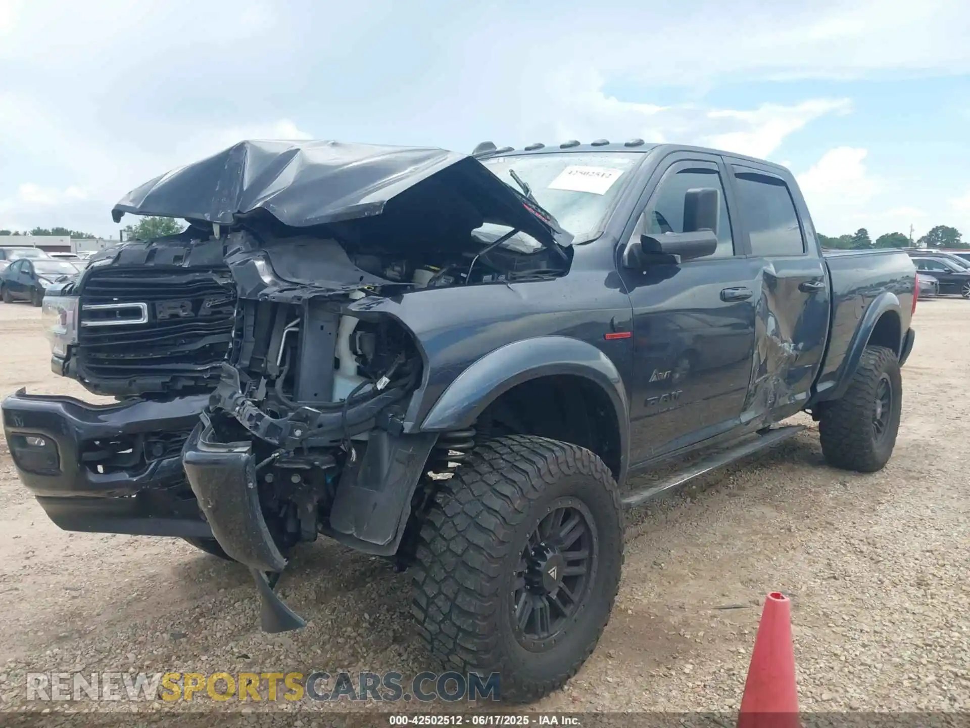 2 Photograph of a damaged car 3C6UR5DLXMG659821 RAM 2500 2021