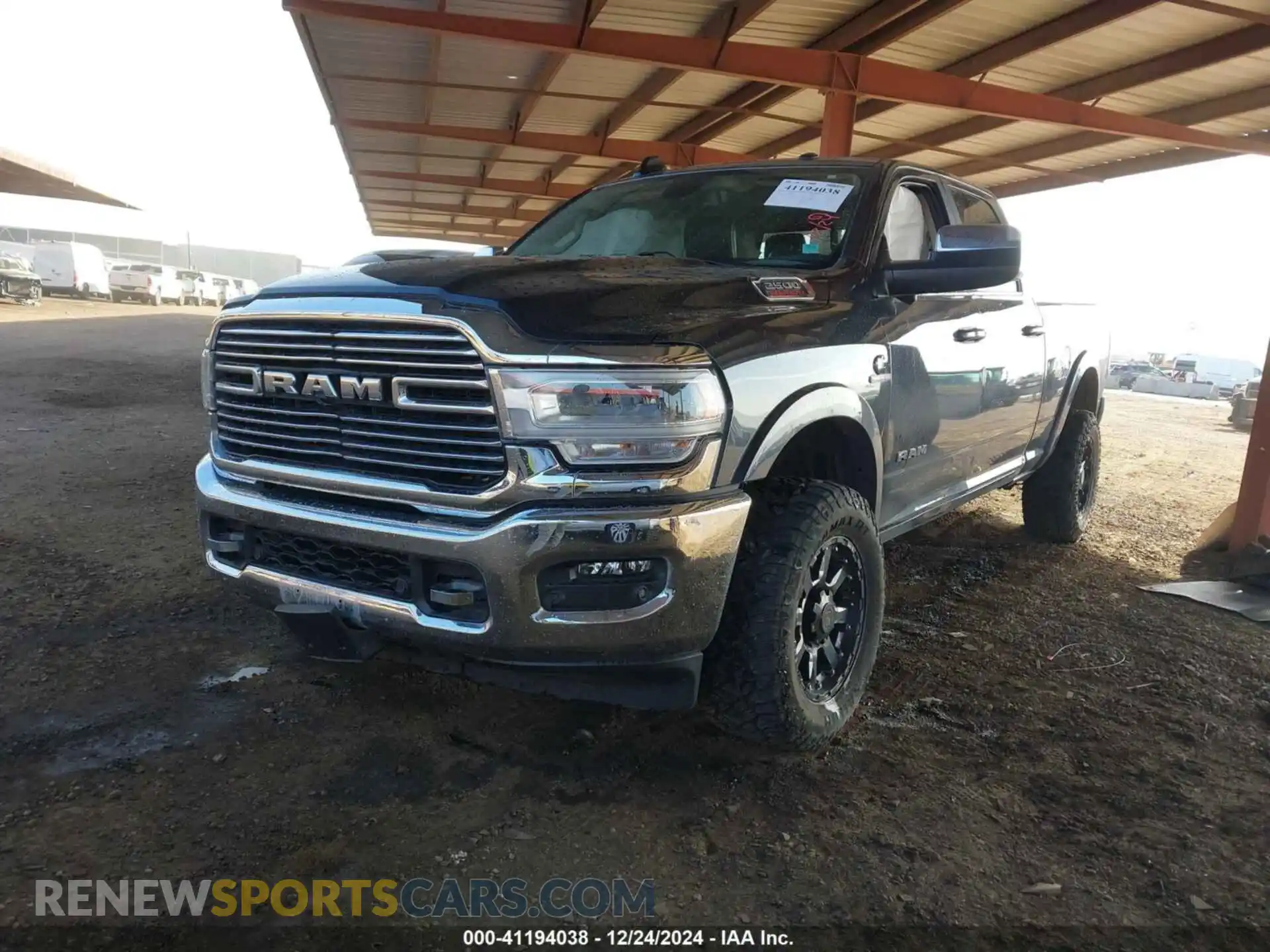 2 Photograph of a damaged car 3C6UR5FL0MG659582 RAM 2500 2021
