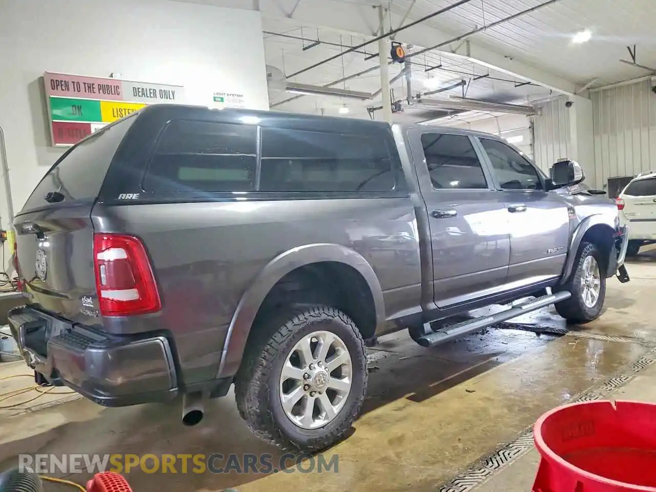 3 Photograph of a damaged car 3C6UR5FL0MG683154 RAM 2500 2021