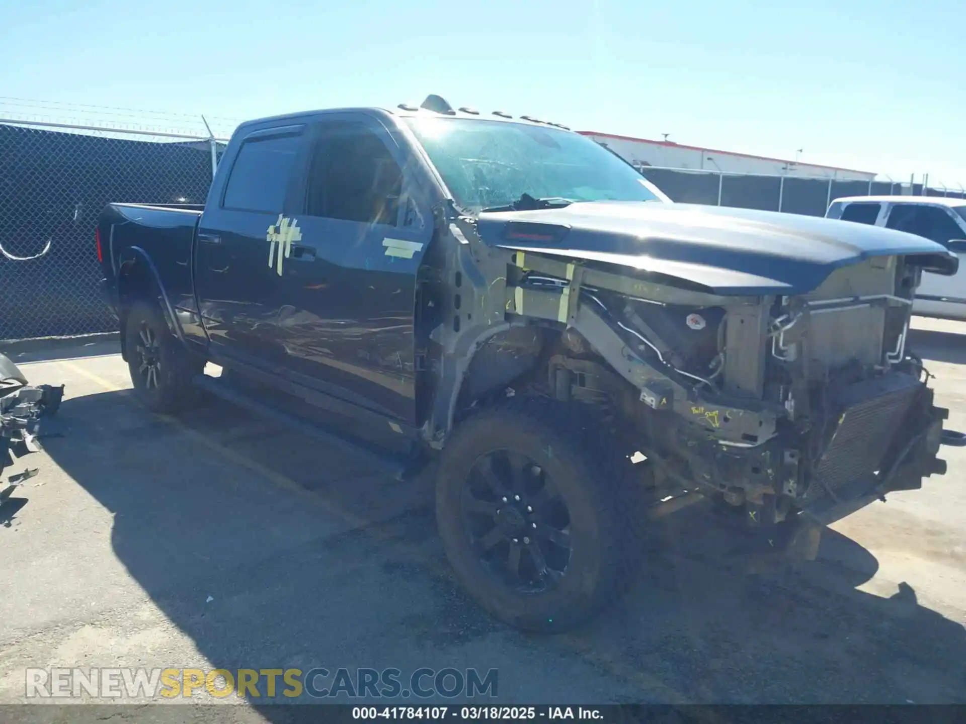 1 Photograph of a damaged car 3C6UR5FL1MG559426 RAM 2500 2021