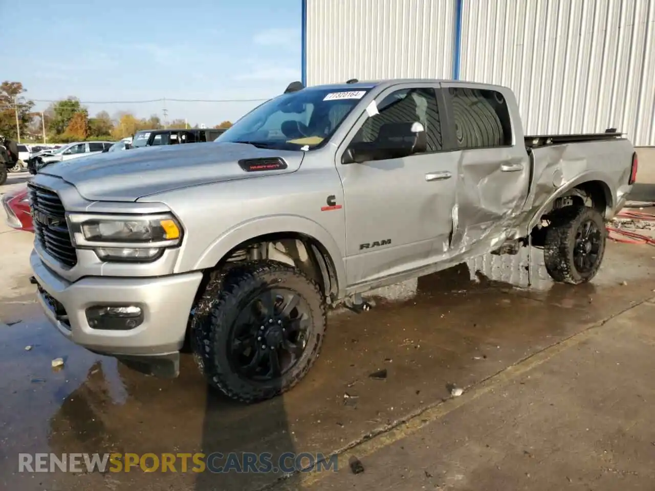 1 Photograph of a damaged car 3C6UR5FL2MG544532 RAM 2500 2021