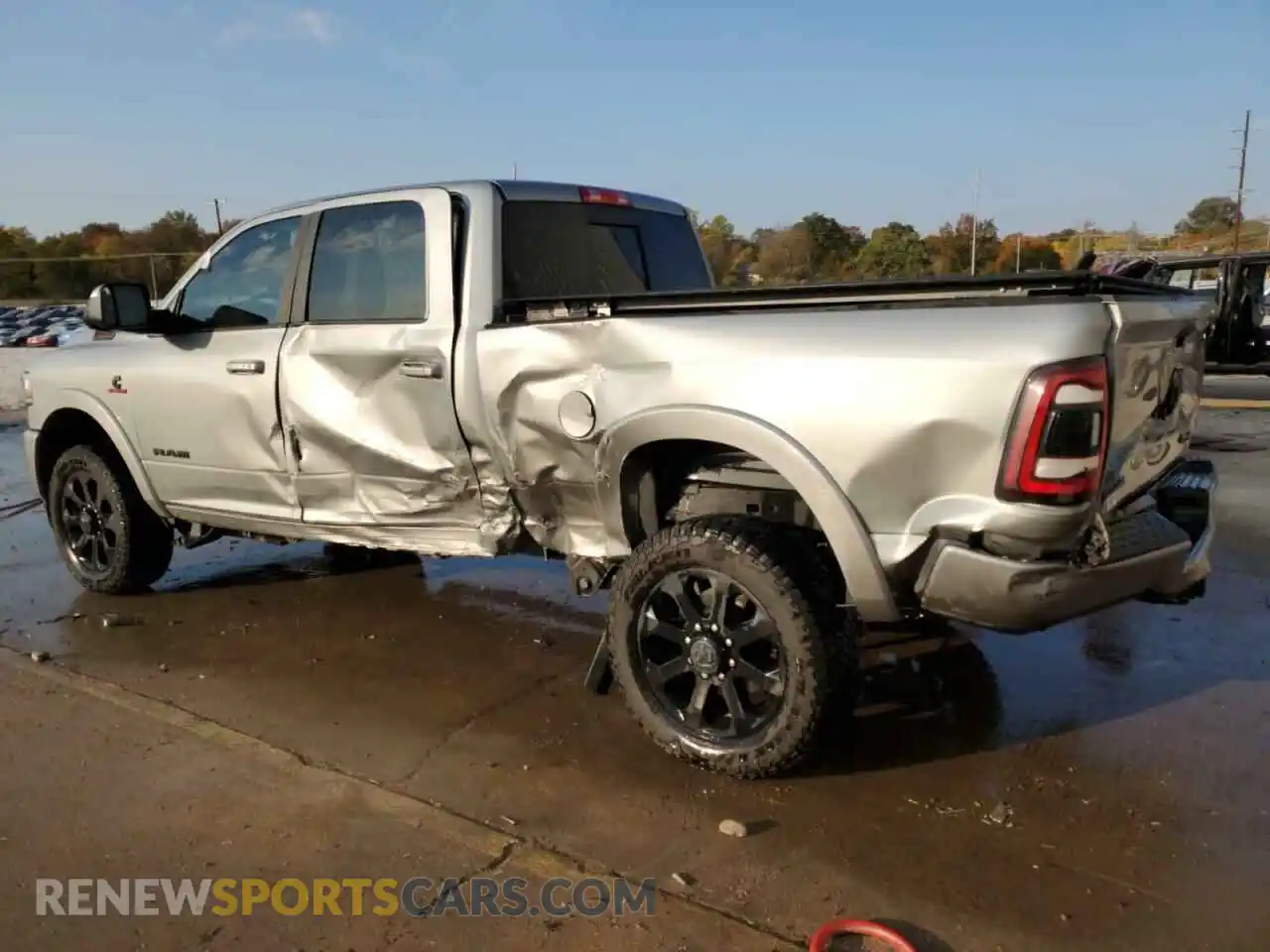 2 Photograph of a damaged car 3C6UR5FL2MG544532 RAM 2500 2021