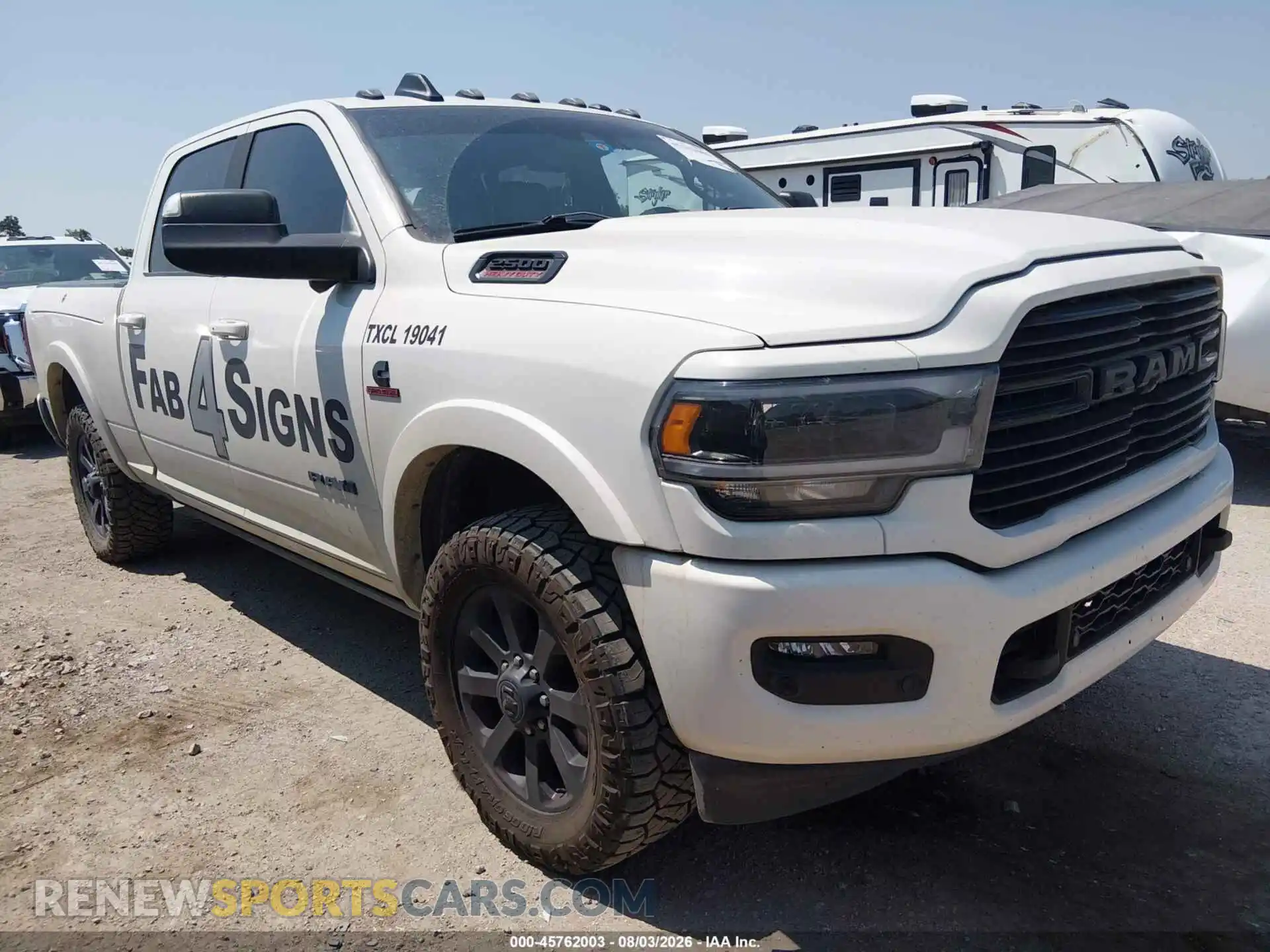 1 Photograph of a damaged car 3C6UR5FL2MG553408 RAM 2500 2021
