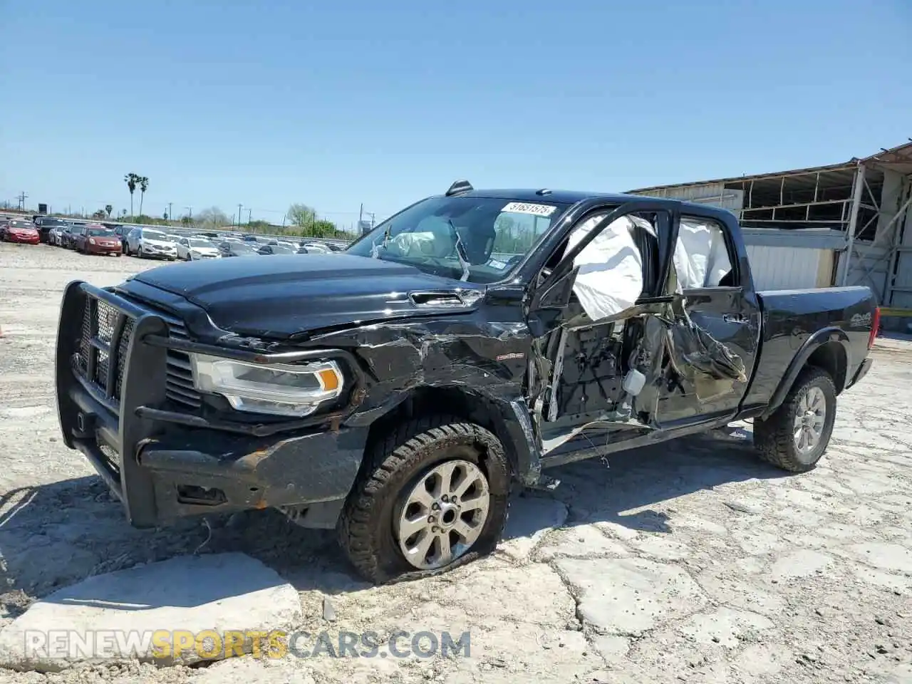 1 Photograph of a damaged car 3C6UR5FL2MG611033 RAM 2500 2021