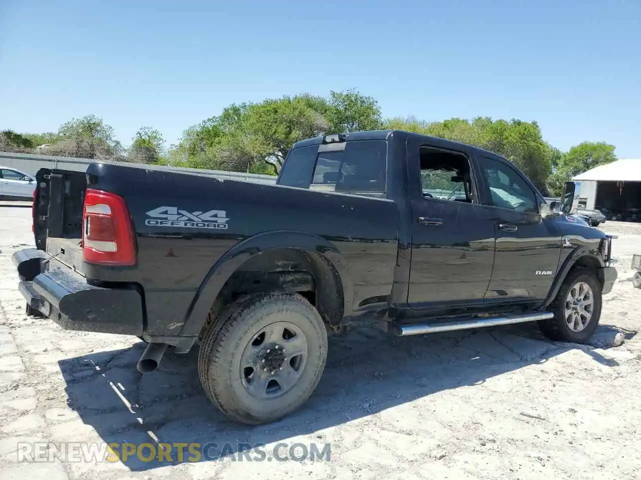 3 Photograph of a damaged car 3C6UR5FL2MG611033 RAM 2500 2021