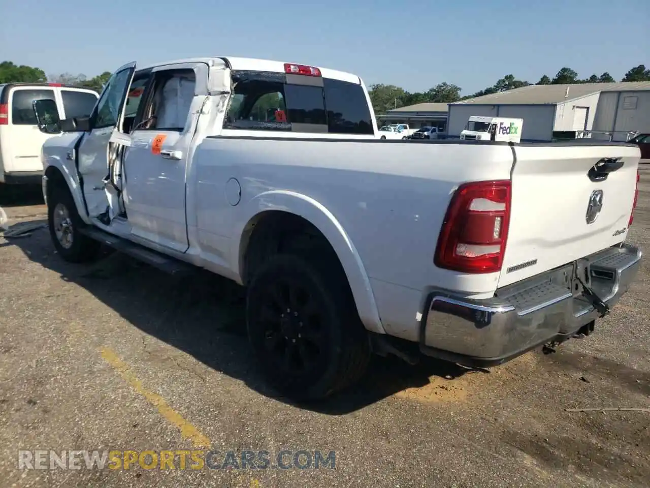2 Photograph of a damaged car 3C6UR5FL3MG630433 RAM 2500 2021