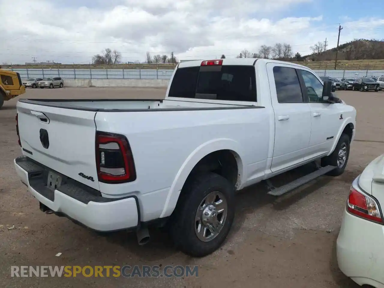 3 Photograph of a damaged car 3C6UR5FL4MG612250 RAM 2500 2021