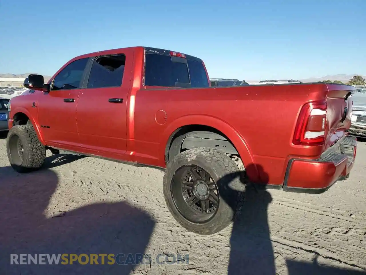 2 Photograph of a damaged car 3C6UR5FL6MG594415 RAM 2500 2021