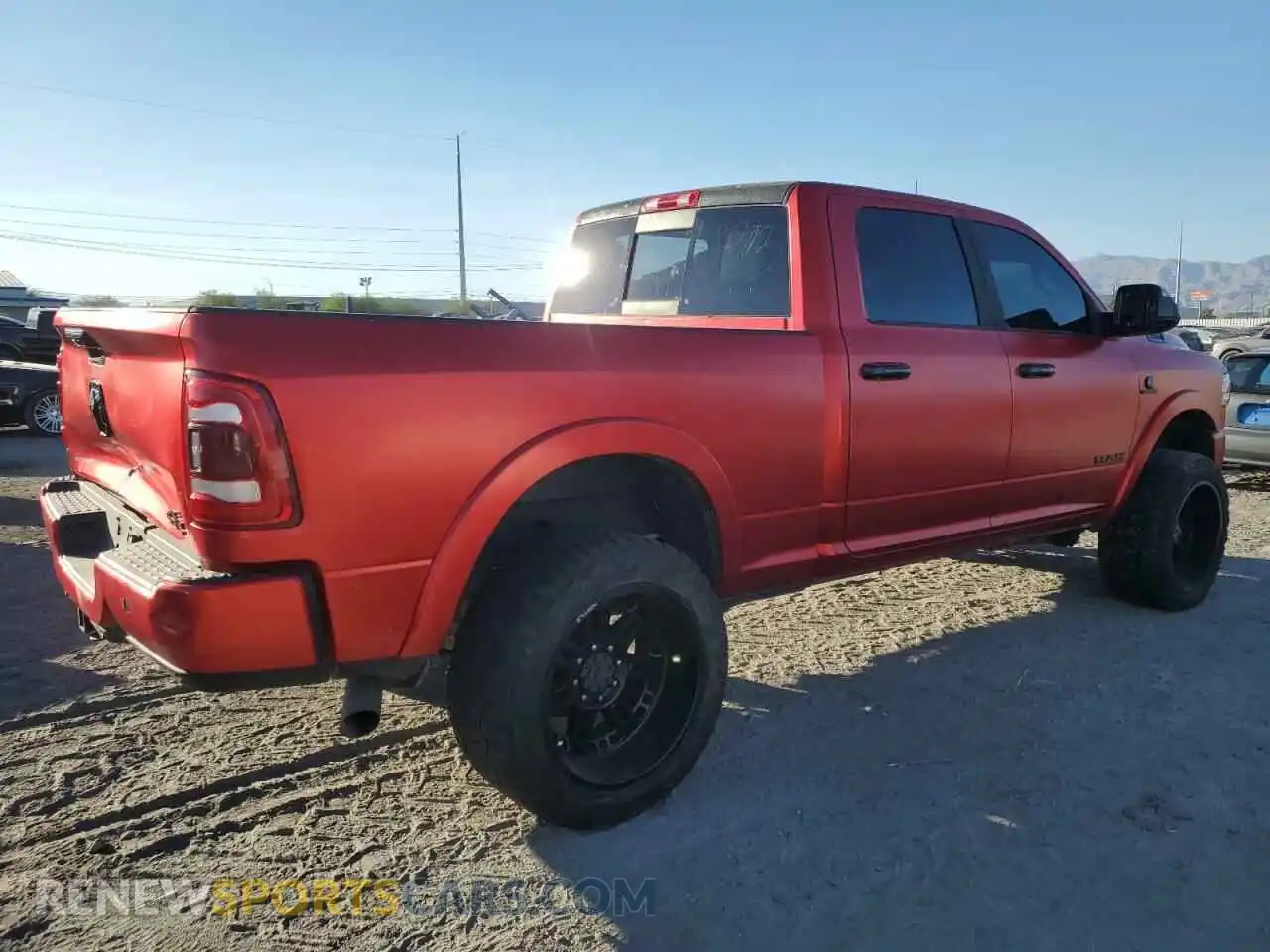 3 Photograph of a damaged car 3C6UR5FL6MG594415 RAM 2500 2021