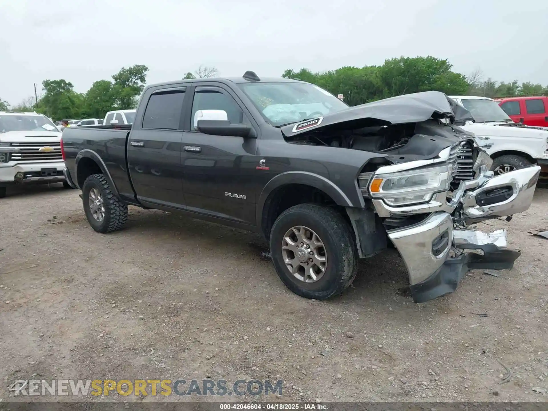 1 Photograph of a damaged car 3C6UR5FL7MG612467 RAM 2500 2021