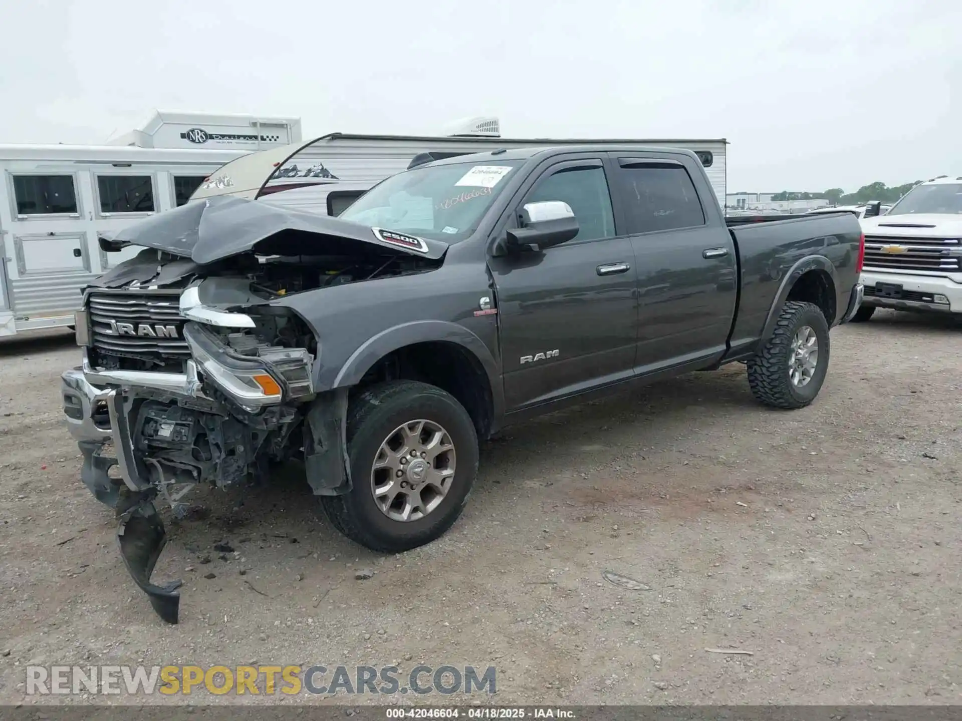 2 Photograph of a damaged car 3C6UR5FL7MG612467 RAM 2500 2021