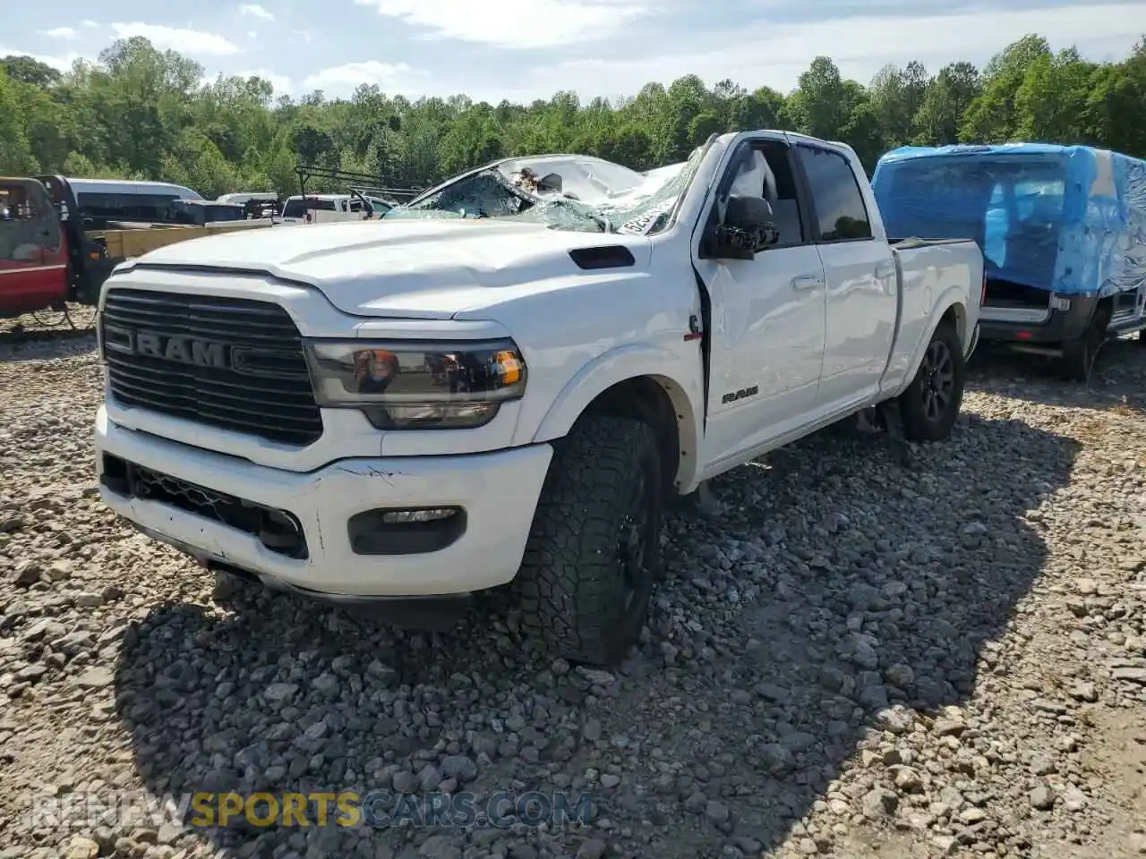 1 Photograph of a damaged car 3C6UR5FL8MG534877 RAM 2500 2021