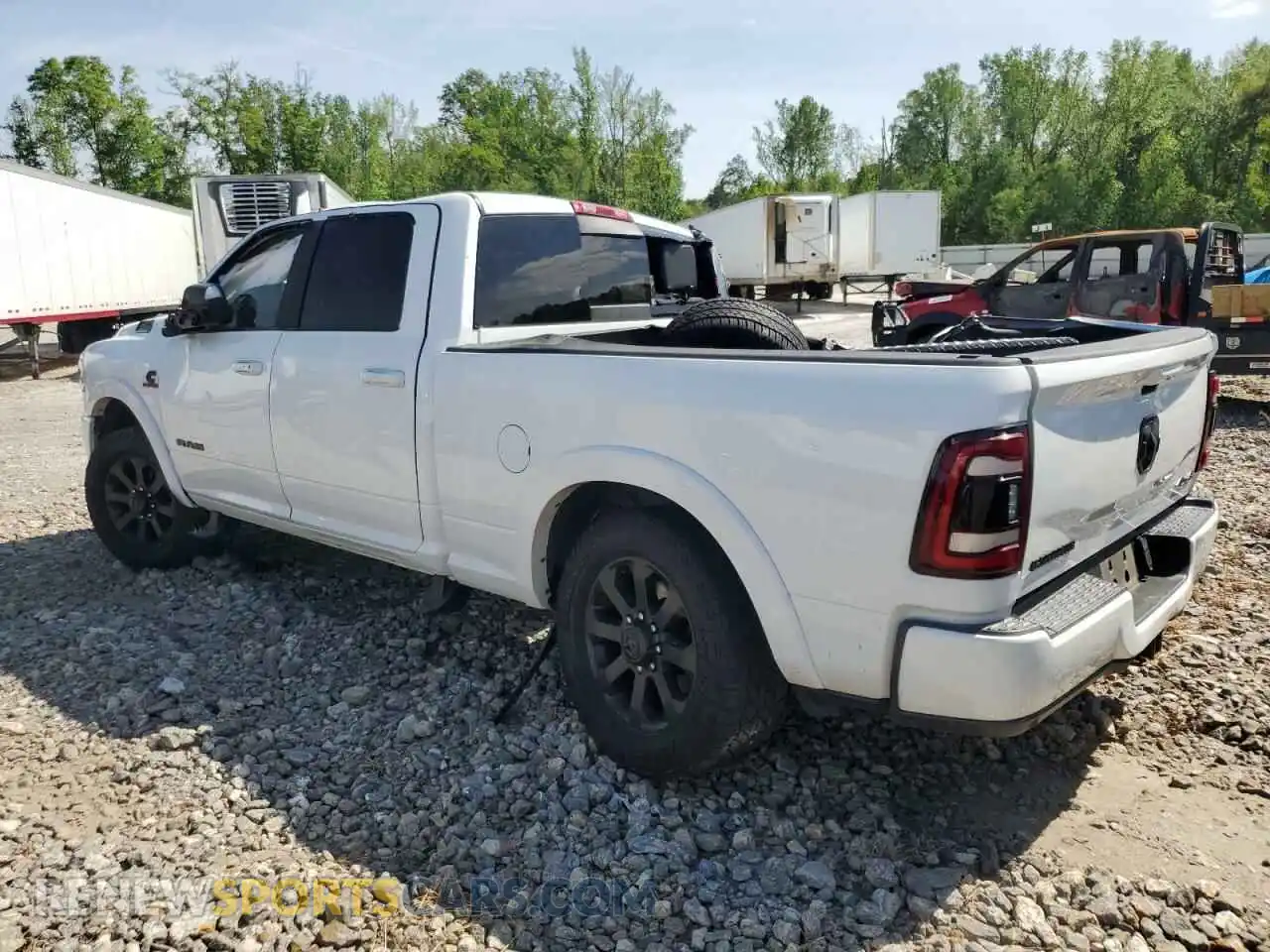 2 Photograph of a damaged car 3C6UR5FL8MG534877 RAM 2500 2021