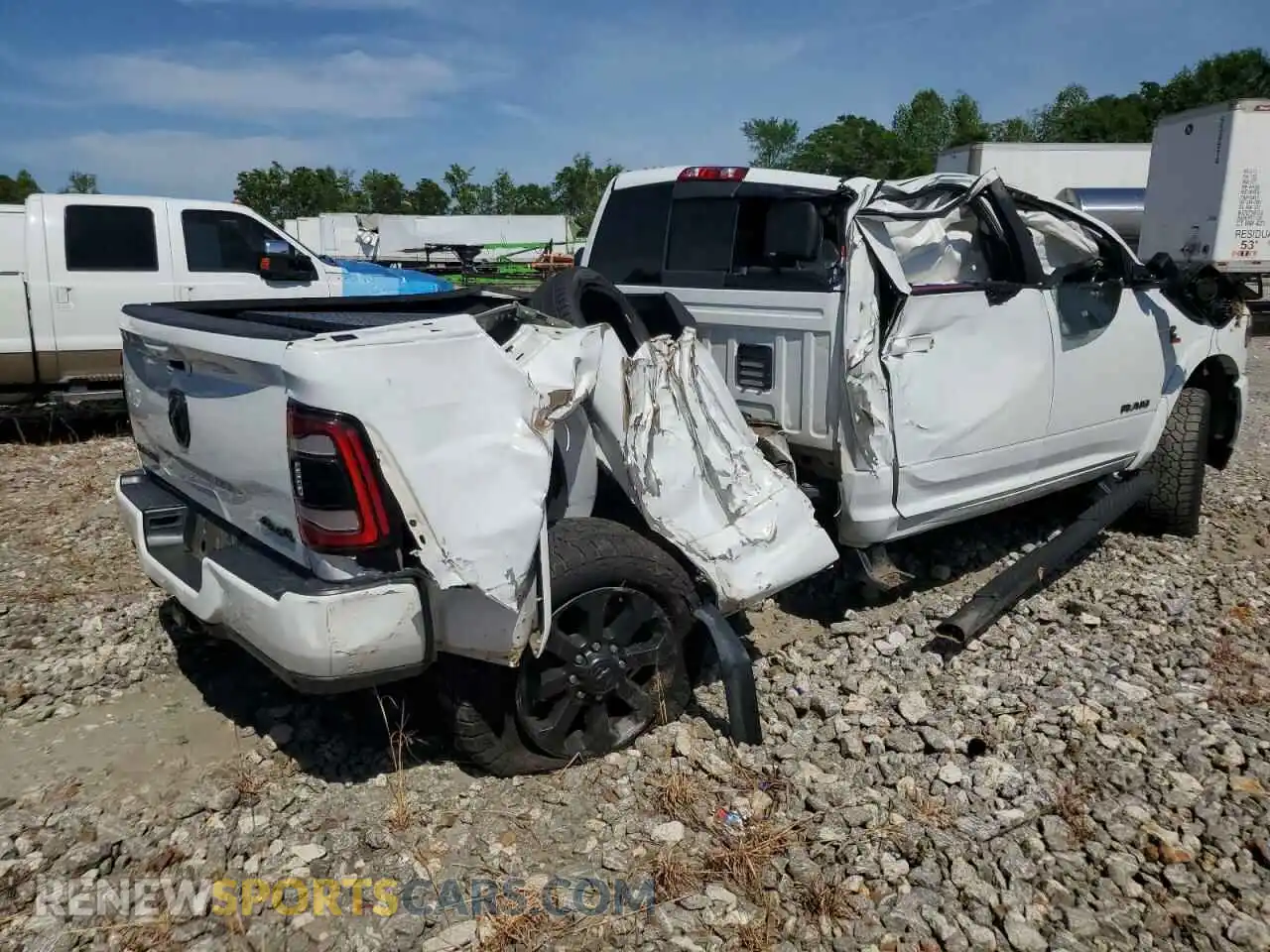3 Photograph of a damaged car 3C6UR5FL8MG534877 RAM 2500 2021