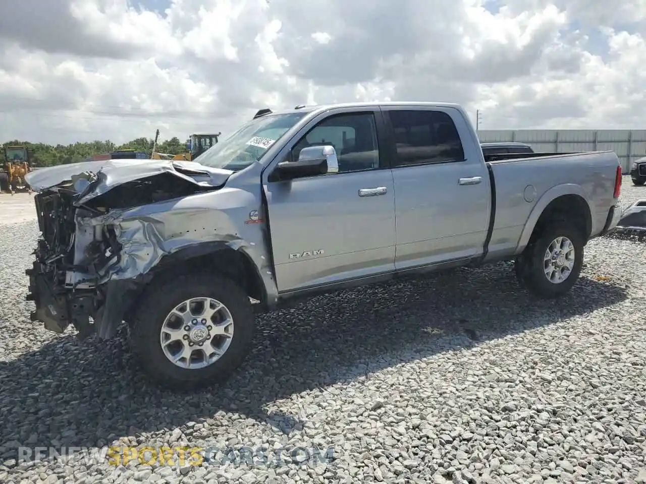 1 Photograph of a damaged car 3C6UR5FL8MG675819 RAM 2500 2021