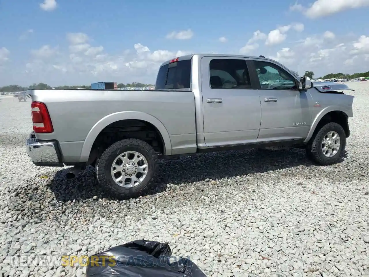 3 Photograph of a damaged car 3C6UR5FL8MG675819 RAM 2500 2021