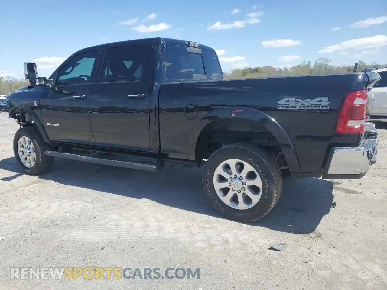 2 Photograph of a damaged car 3C6UR5FL9MG561585 RAM 2500 2021