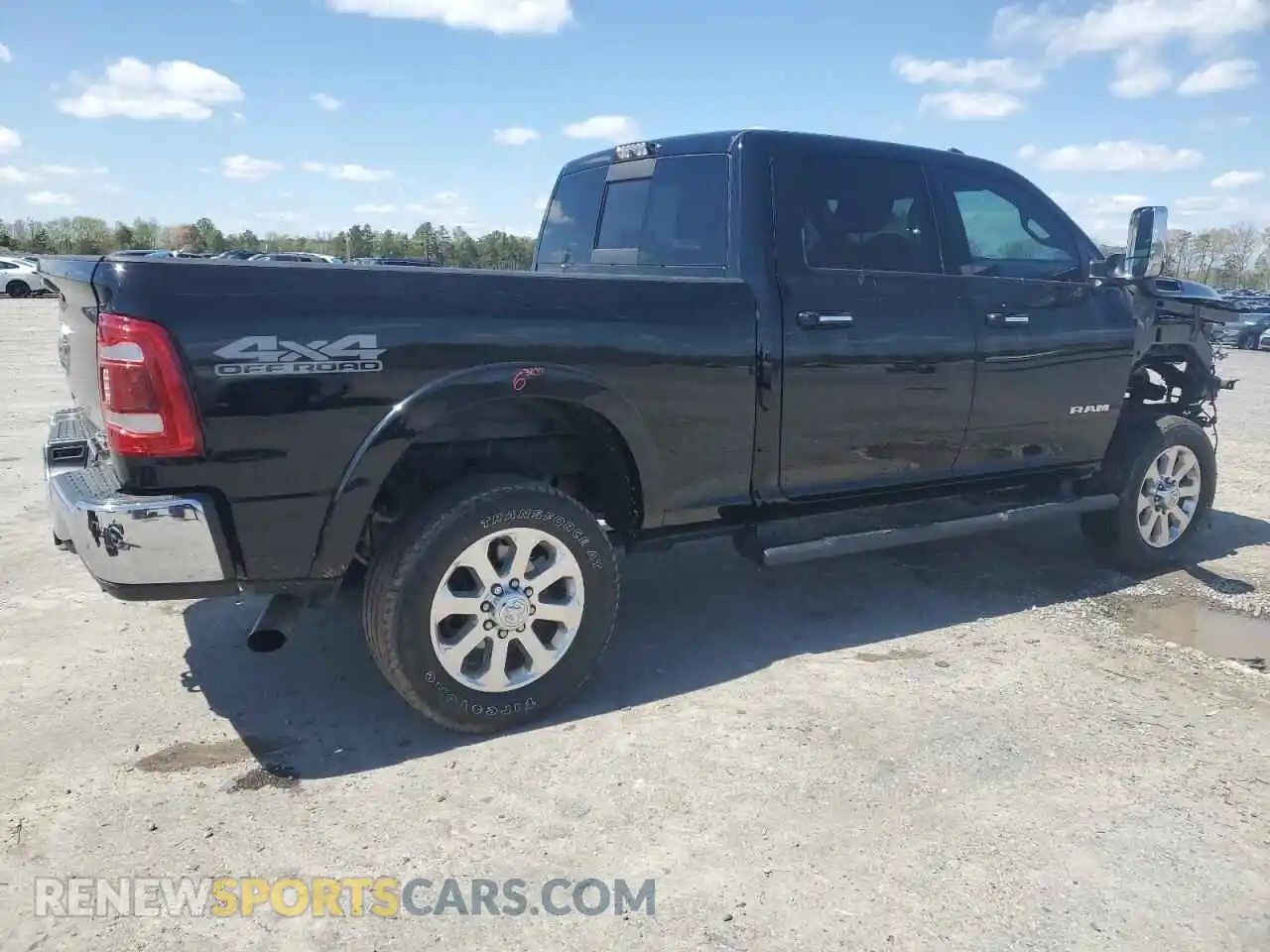 3 Photograph of a damaged car 3C6UR5FL9MG561585 RAM 2500 2021