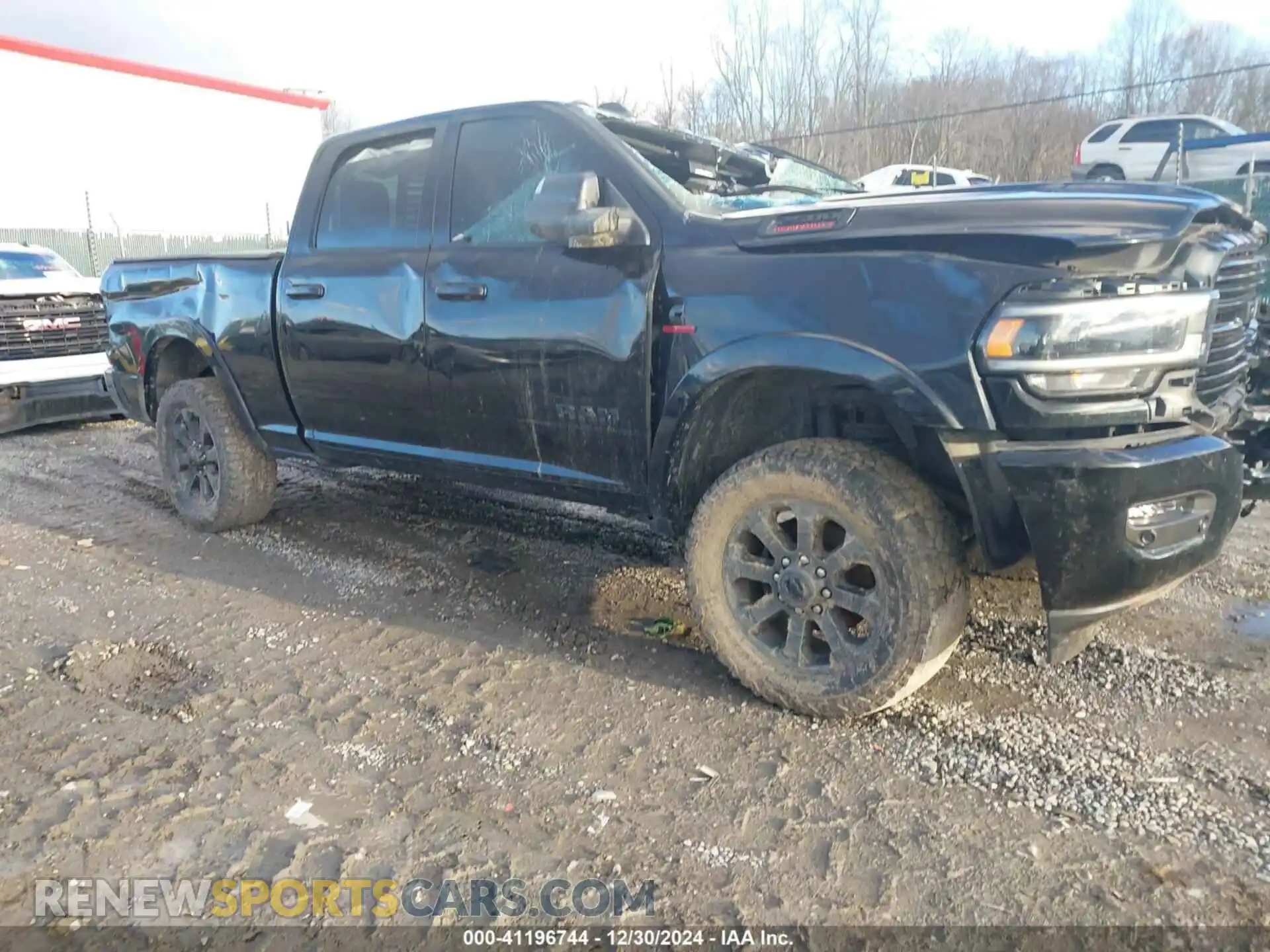 1 Photograph of a damaged car 3C6UR5FL9MG581156 RAM 2500 2021