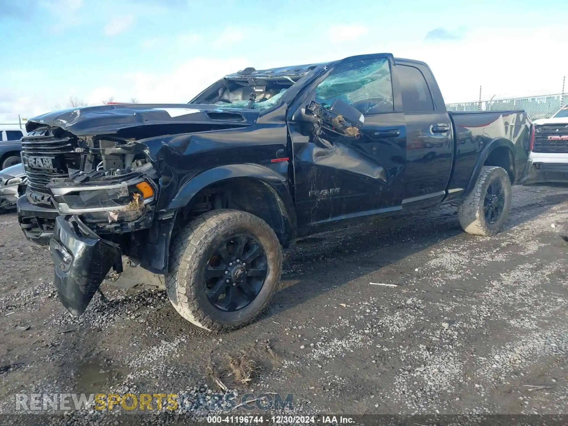 2 Photograph of a damaged car 3C6UR5FL9MG581156 RAM 2500 2021