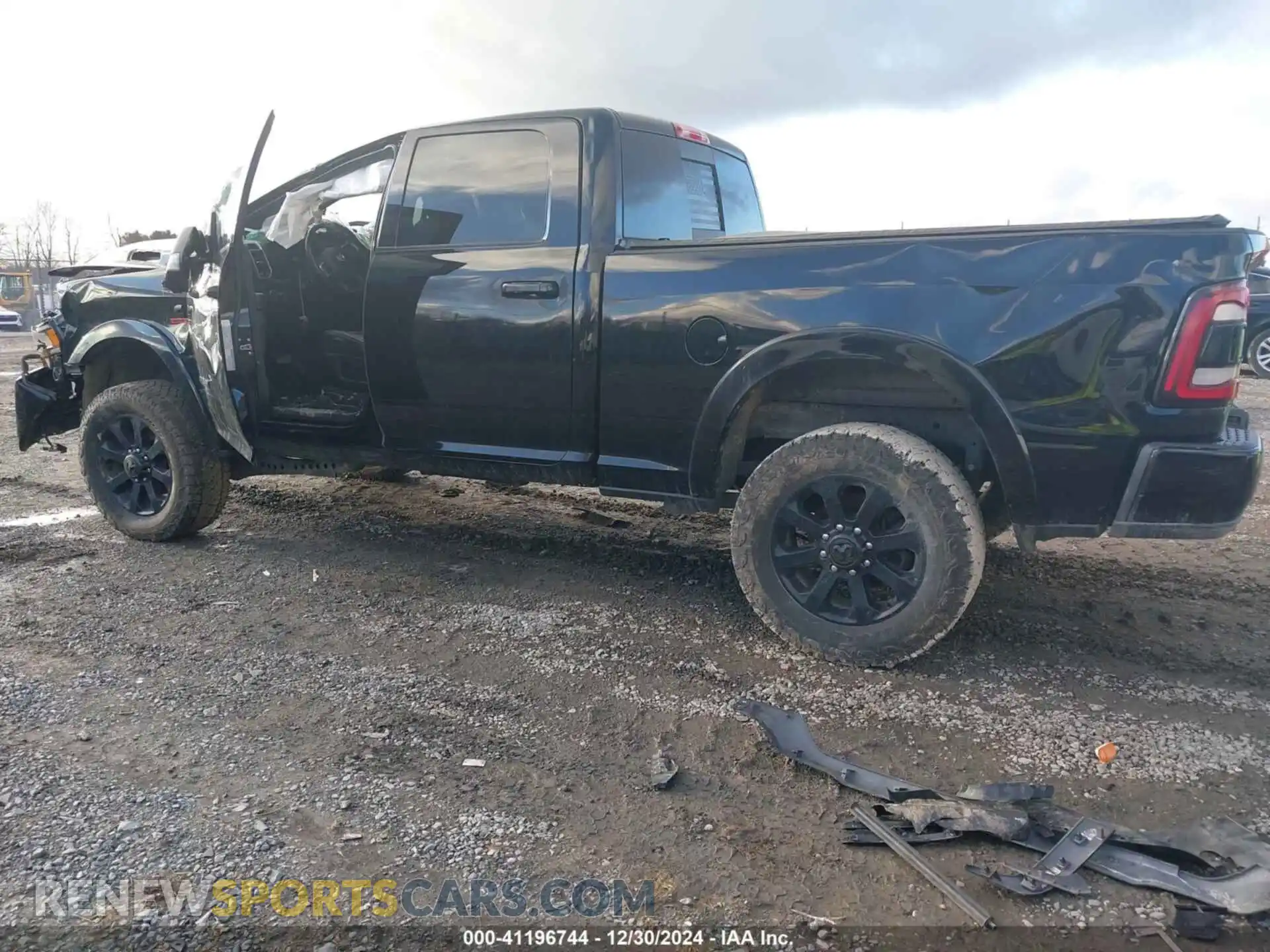 3 Photograph of a damaged car 3C6UR5FL9MG581156 RAM 2500 2021