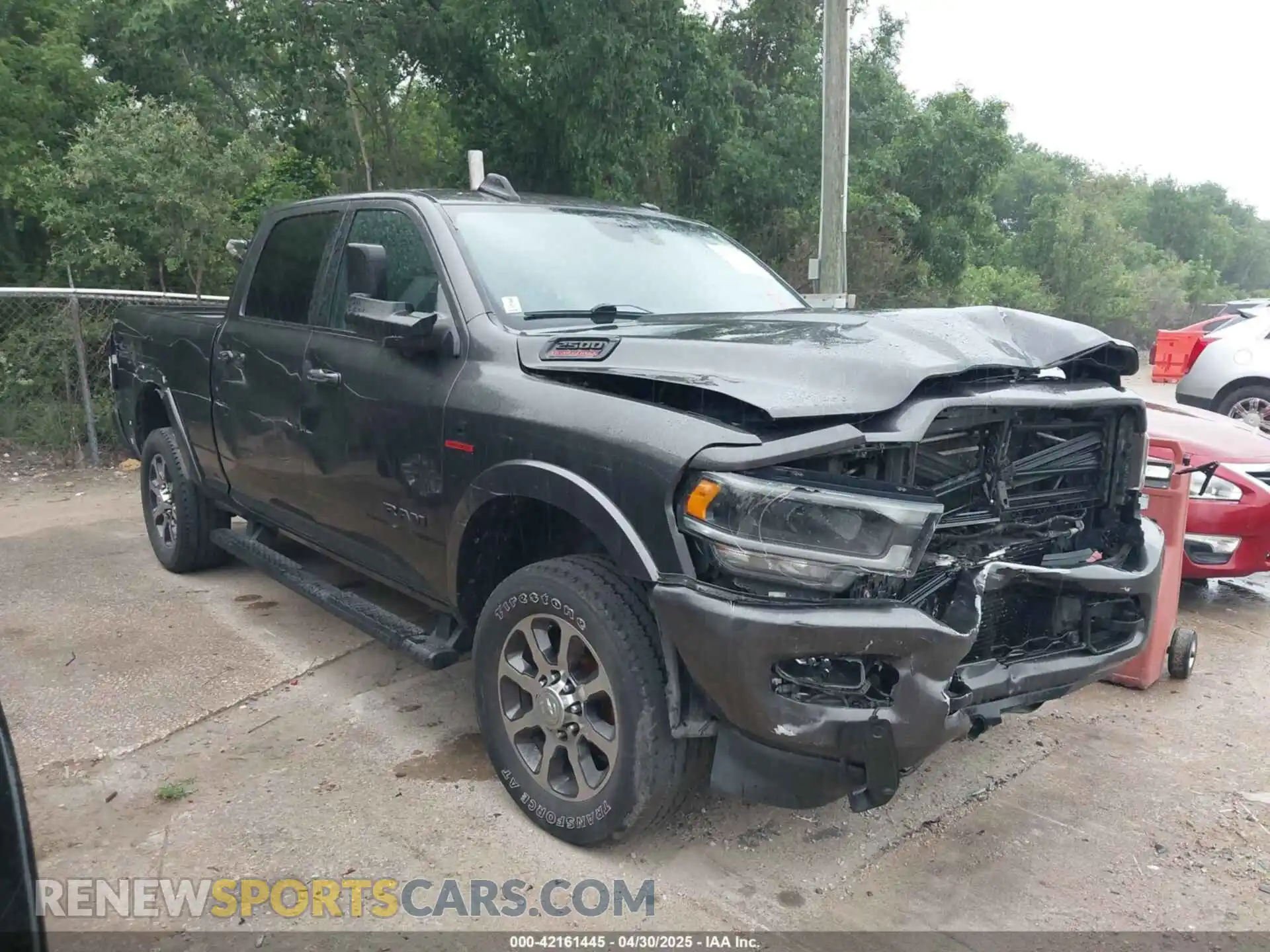 1 Photograph of a damaged car 3C6UR5FLXMG590626 RAM 2500 2021