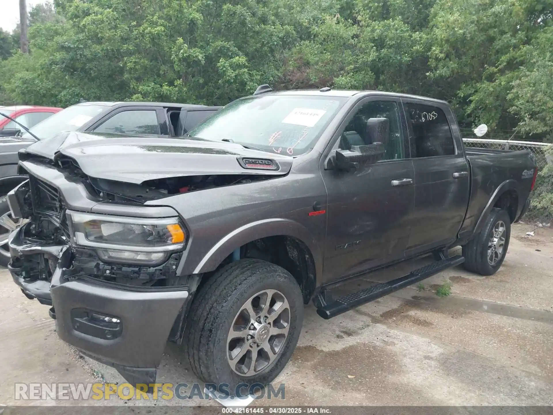 2 Photograph of a damaged car 3C6UR5FLXMG590626 RAM 2500 2021