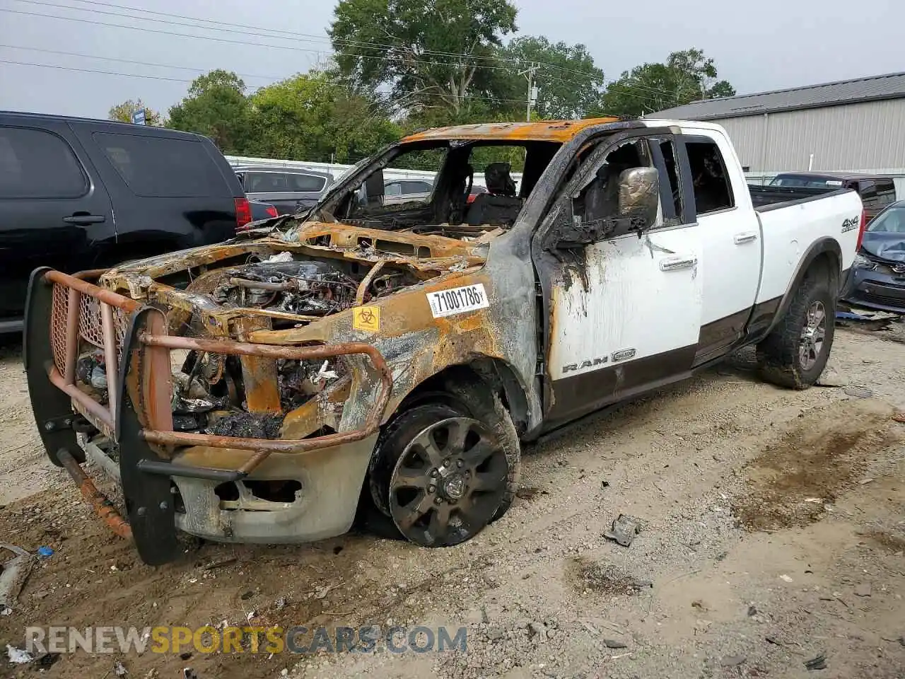 1 Photograph of a damaged car 3C6UR5GL6MG641652 RAM 2500 2021