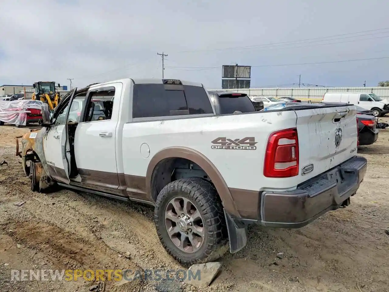 2 Photograph of a damaged car 3C6UR5GL6MG641652 RAM 2500 2021