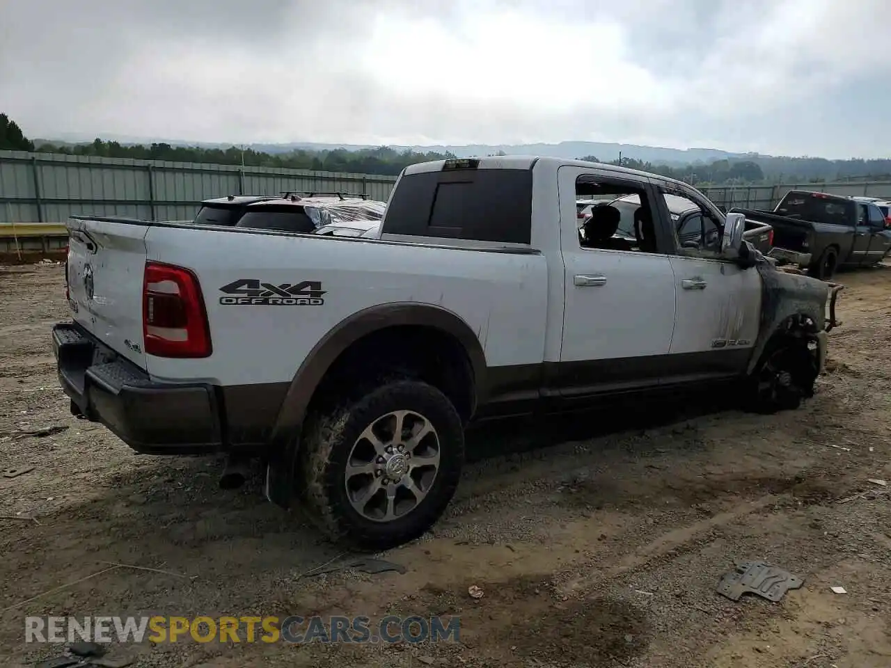 3 Photograph of a damaged car 3C6UR5GL6MG641652 RAM 2500 2021