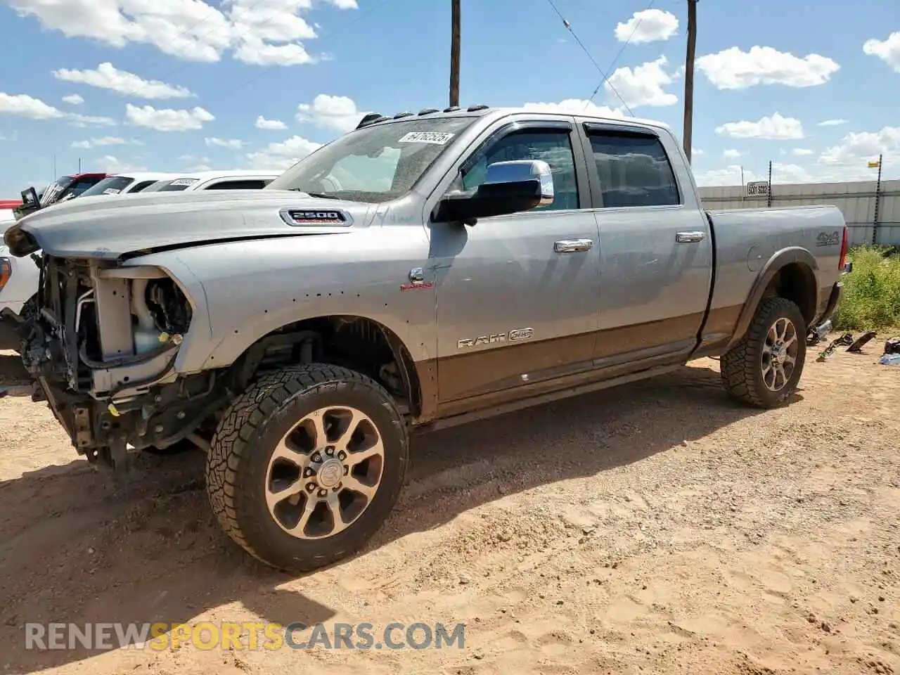 1 Photograph of a damaged car 3C6UR5GL8MG580708 RAM 2500 2021