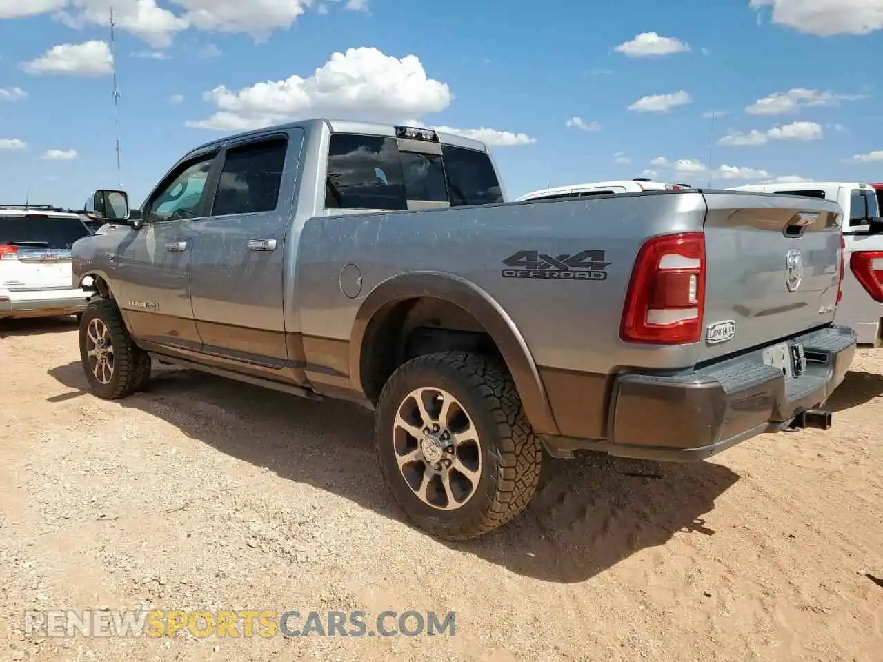 2 Photograph of a damaged car 3C6UR5GL8MG580708 RAM 2500 2021