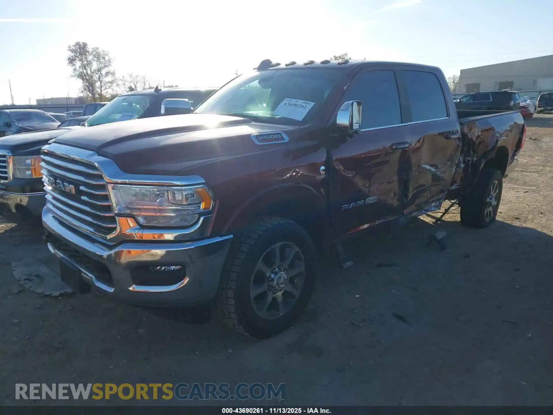 2 Photograph of a damaged car 3C6UR5GL9MG544431 RAM 2500 2021