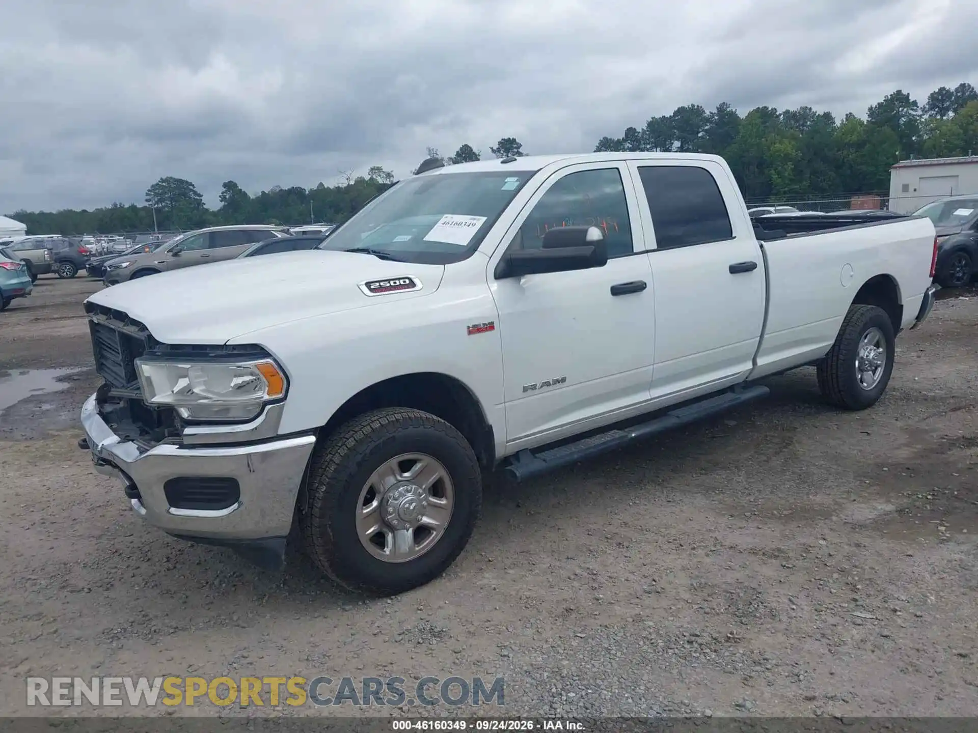 2 Photograph of a damaged car 3C6UR5HJ0MG582353 RAM 2500 2021