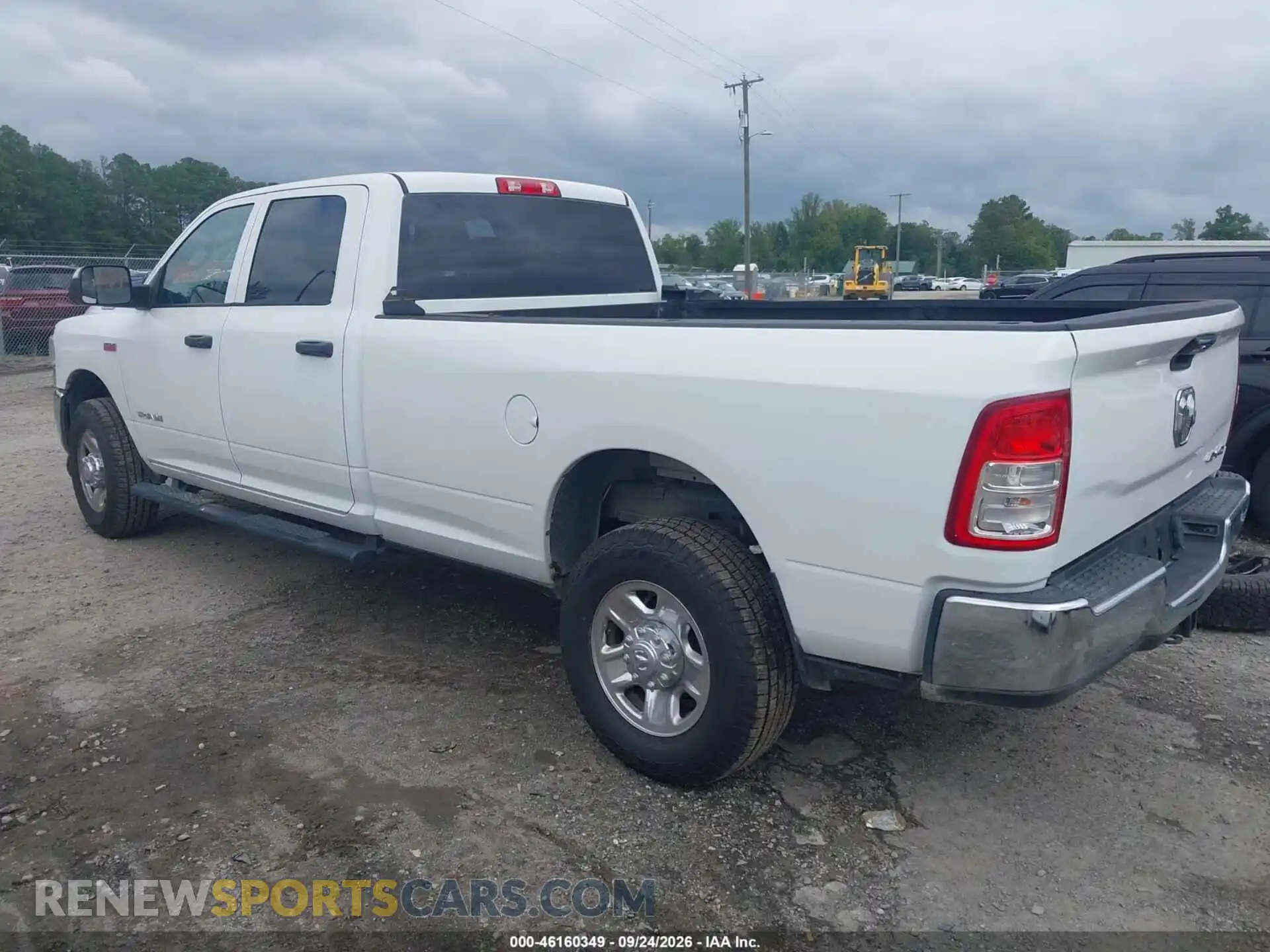 3 Photograph of a damaged car 3C6UR5HJ0MG582353 RAM 2500 2021