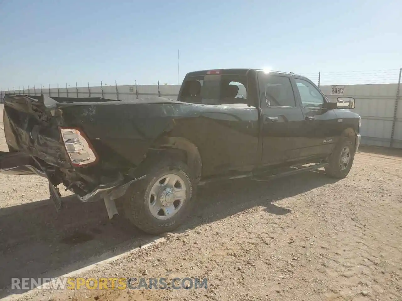 3 Photograph of a damaged car 3C6UR5HJ2MG675617 RAM 2500 2021