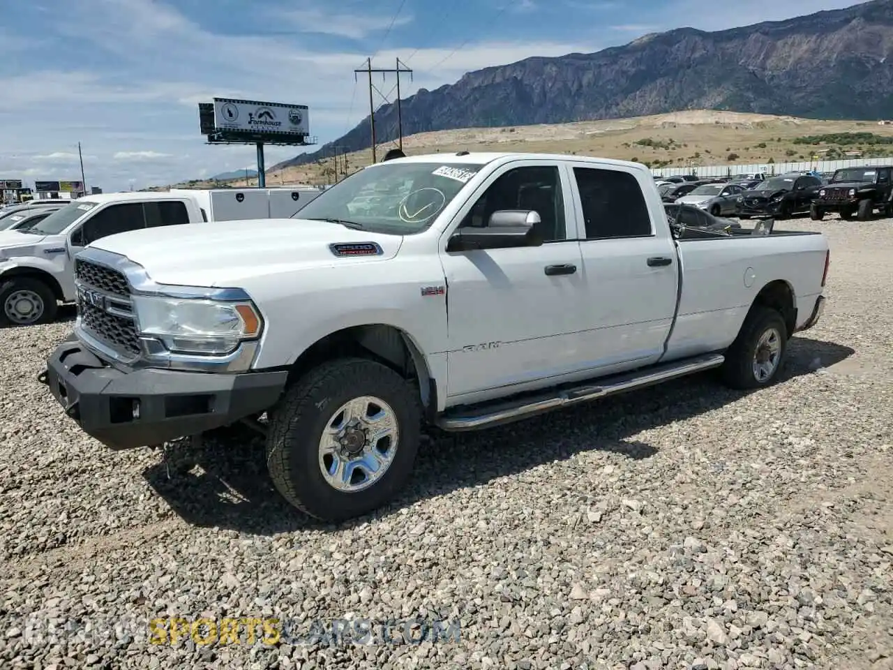 1 Photograph of a damaged car 3C6UR5HJ8MG601764 RAM 2500 2021