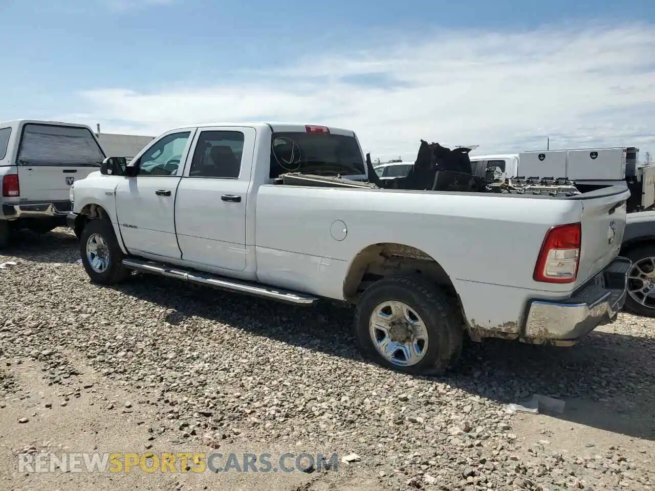 2 Photograph of a damaged car 3C6UR5HJ8MG601764 RAM 2500 2021