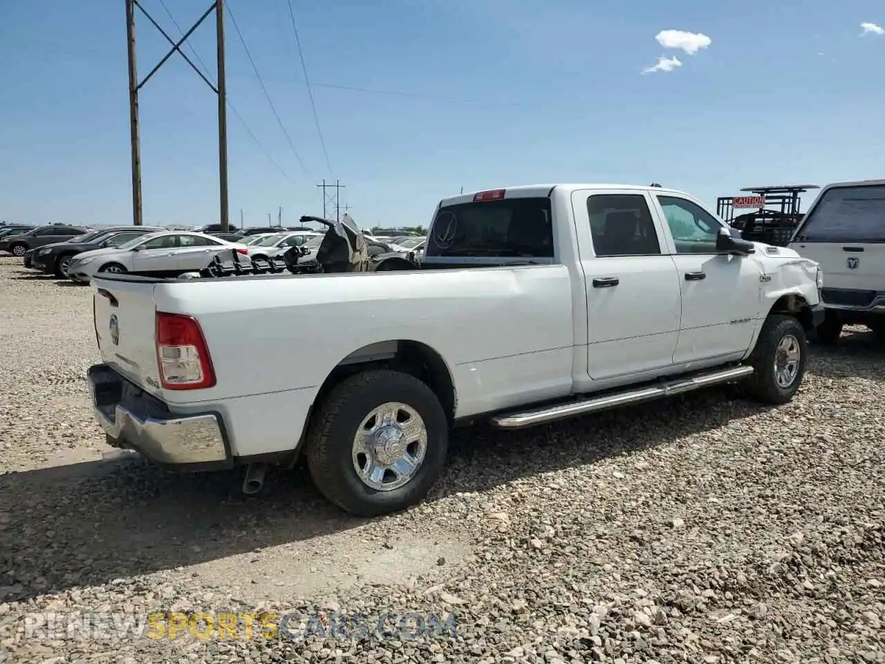 3 Photograph of a damaged car 3C6UR5HJ8MG601764 RAM 2500 2021