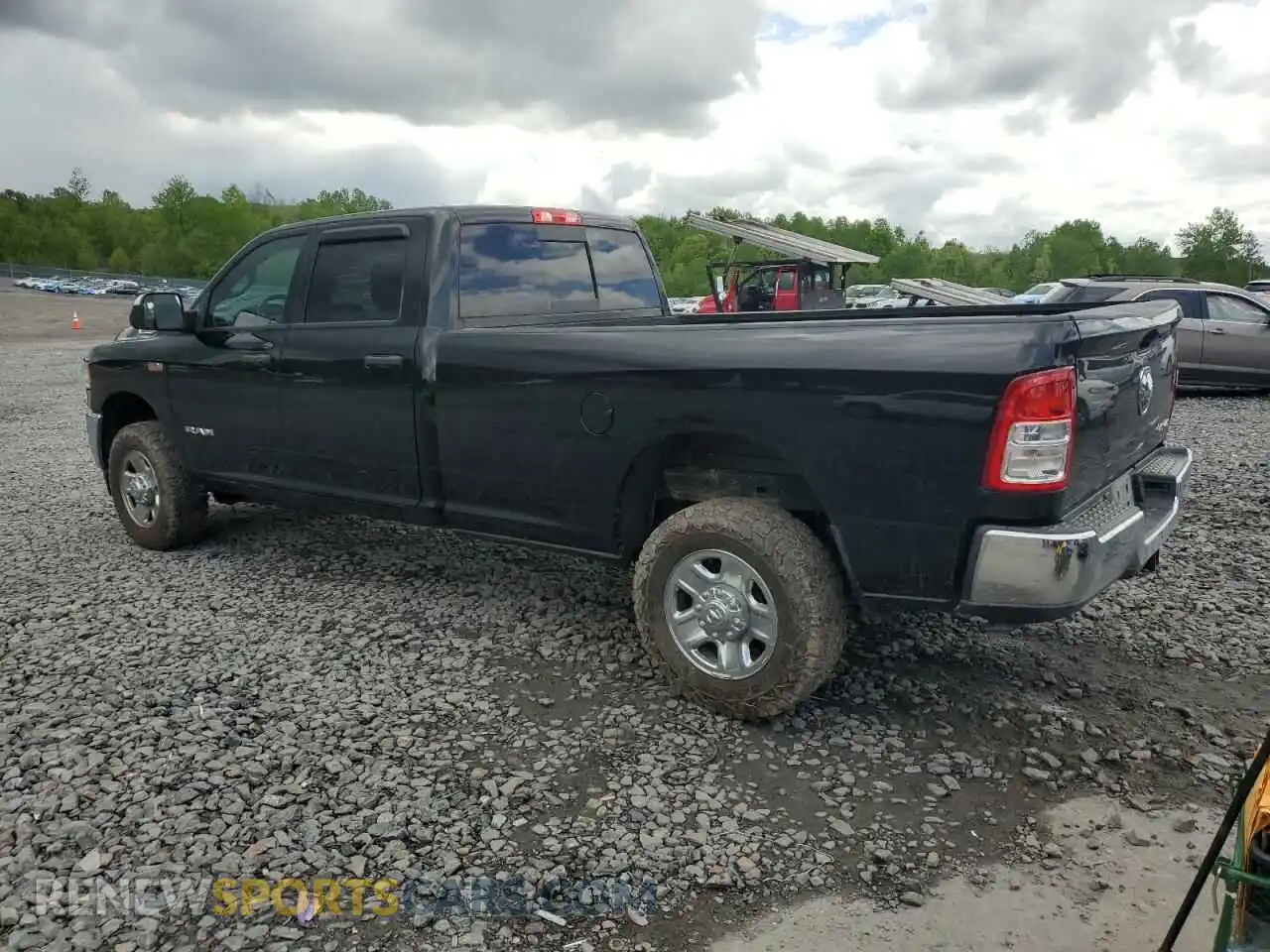 2 Photograph of a damaged car 3C6UR5HJXMG632935 RAM 2500 2021