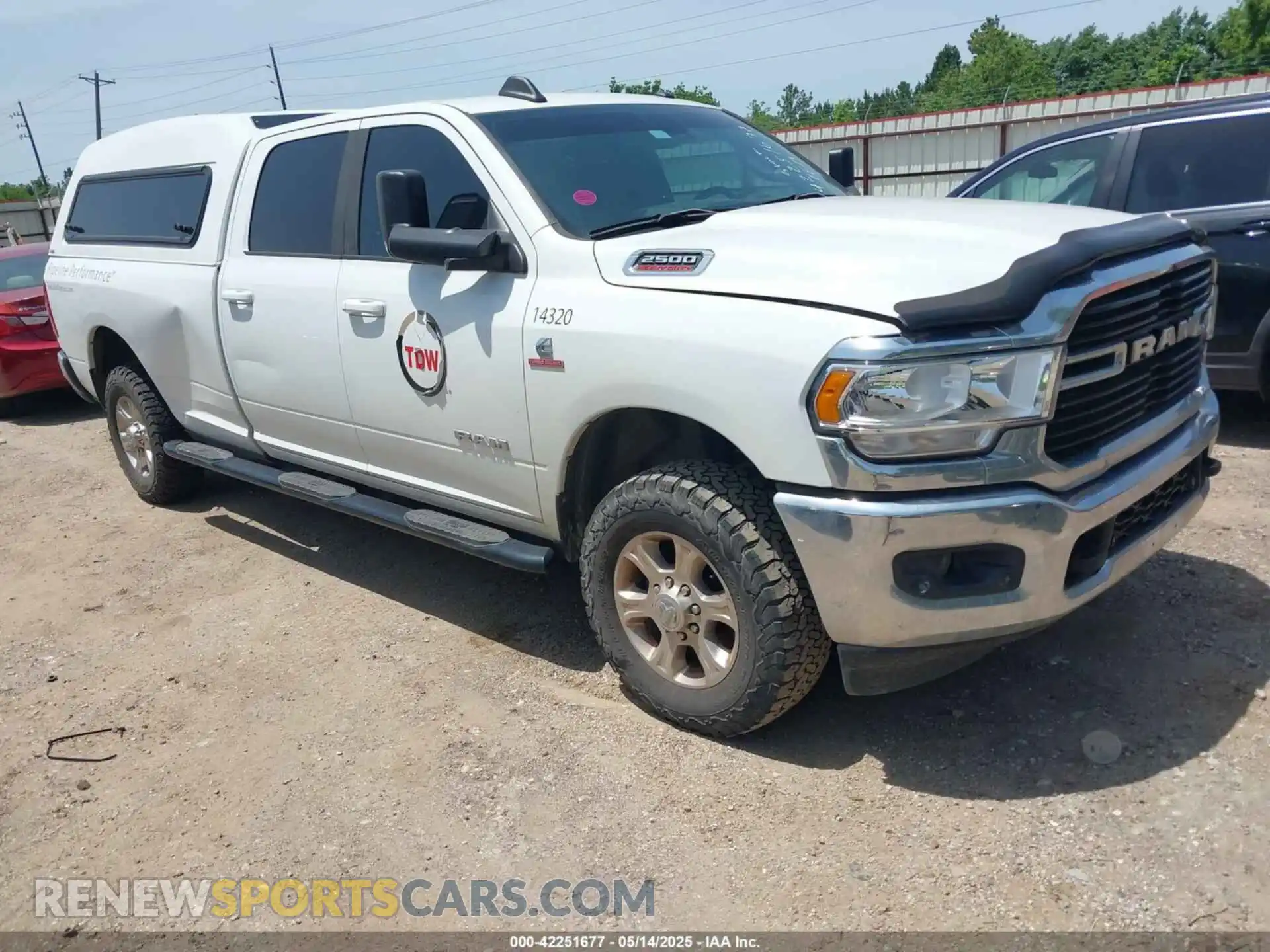 1 Photograph of a damaged car 3C6UR5JL1MG652017 RAM 2500 2021
