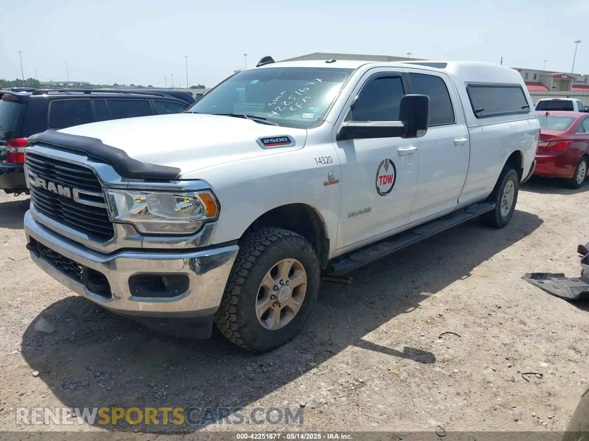 2 Photograph of a damaged car 3C6UR5JL1MG652017 RAM 2500 2021