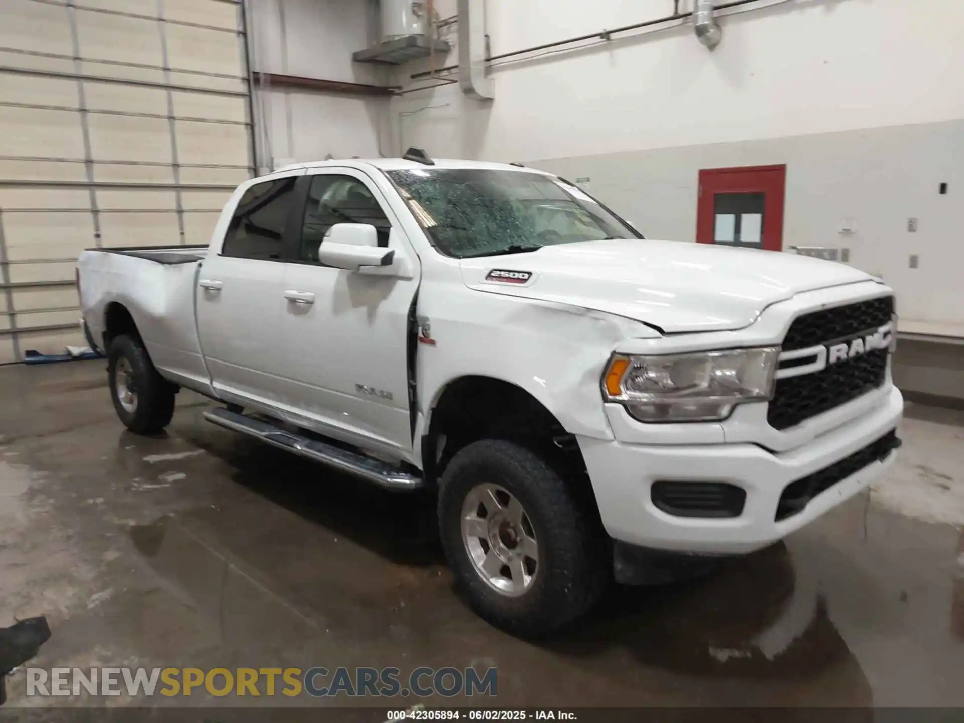 1 Photograph of a damaged car 3C6UR5JL5MG554642 RAM 2500 2021