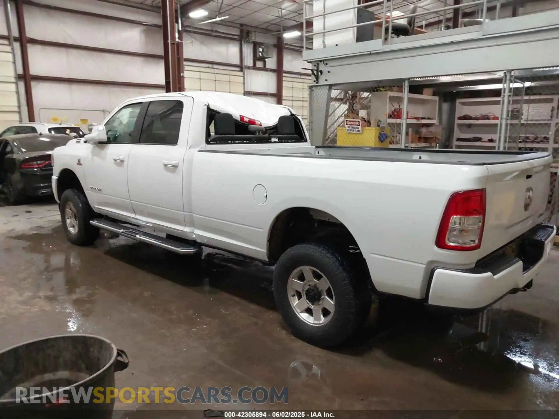 3 Photograph of a damaged car 3C6UR5JL5MG554642 RAM 2500 2021