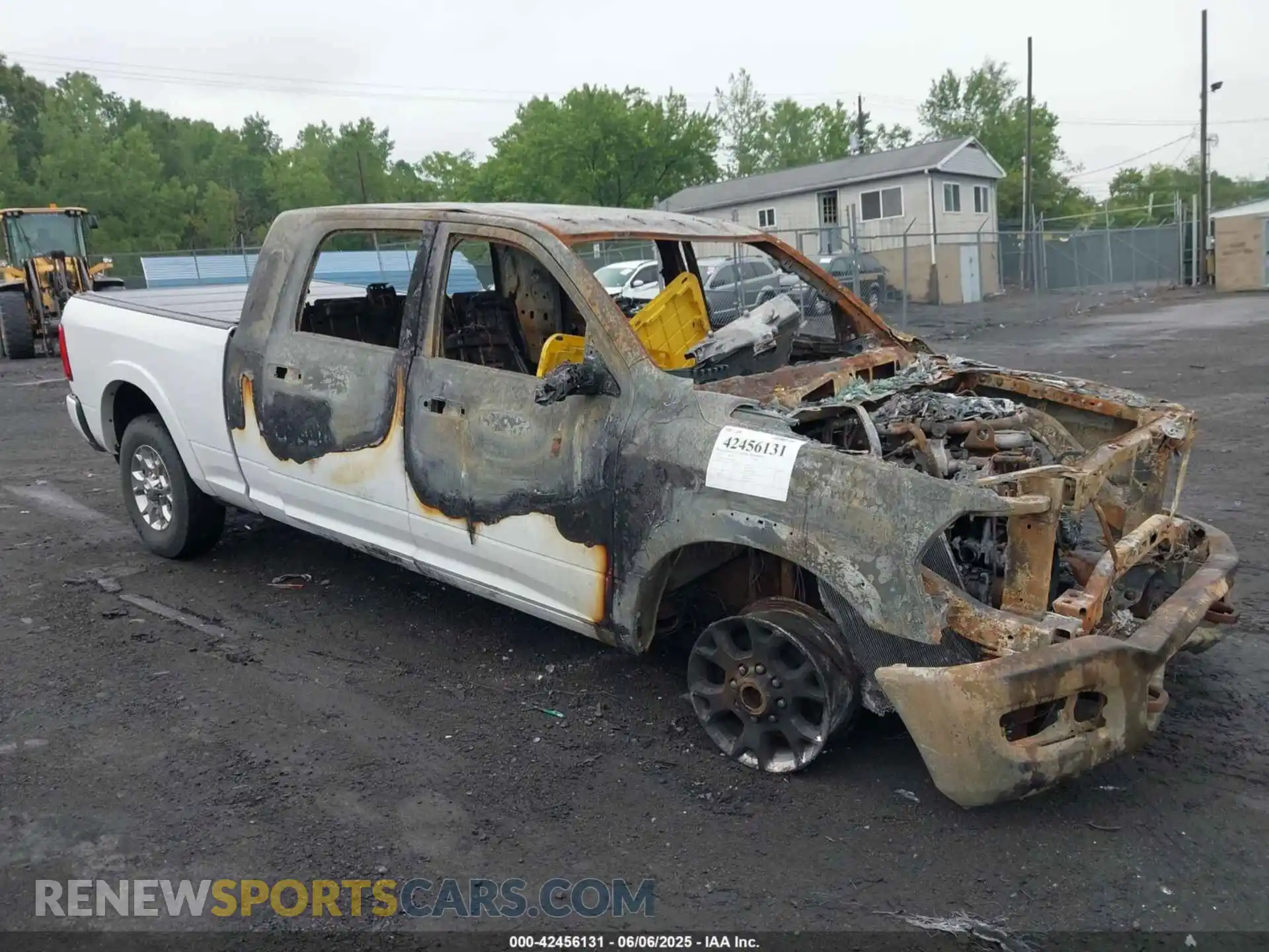 1 Photograph of a damaged car 3C6UR5NL4MG583043 RAM 2500 2021