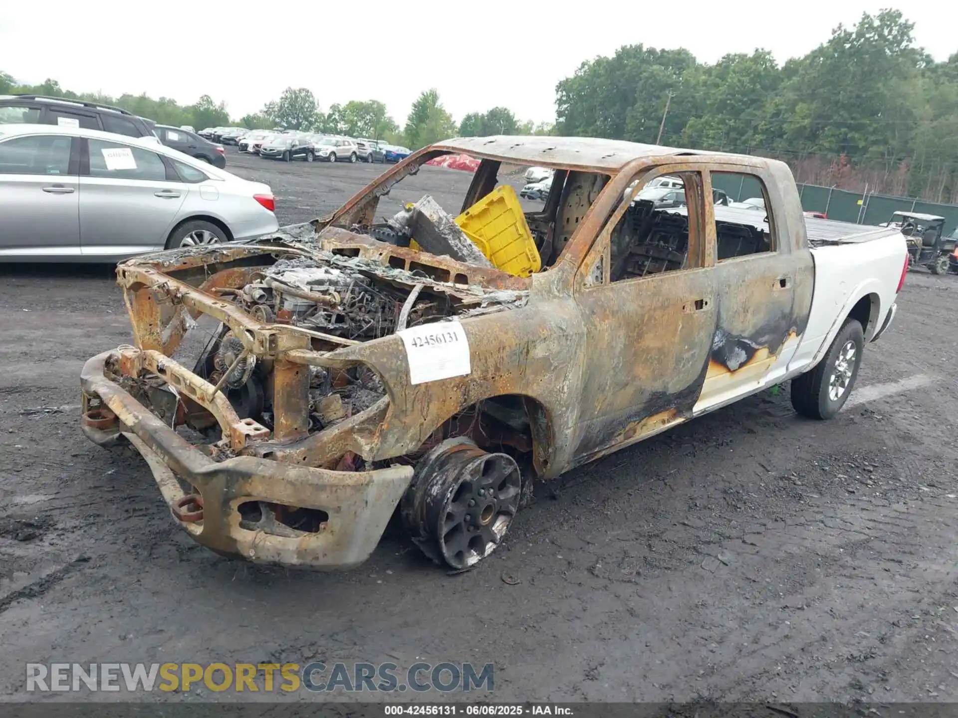 2 Photograph of a damaged car 3C6UR5NL4MG583043 RAM 2500 2021