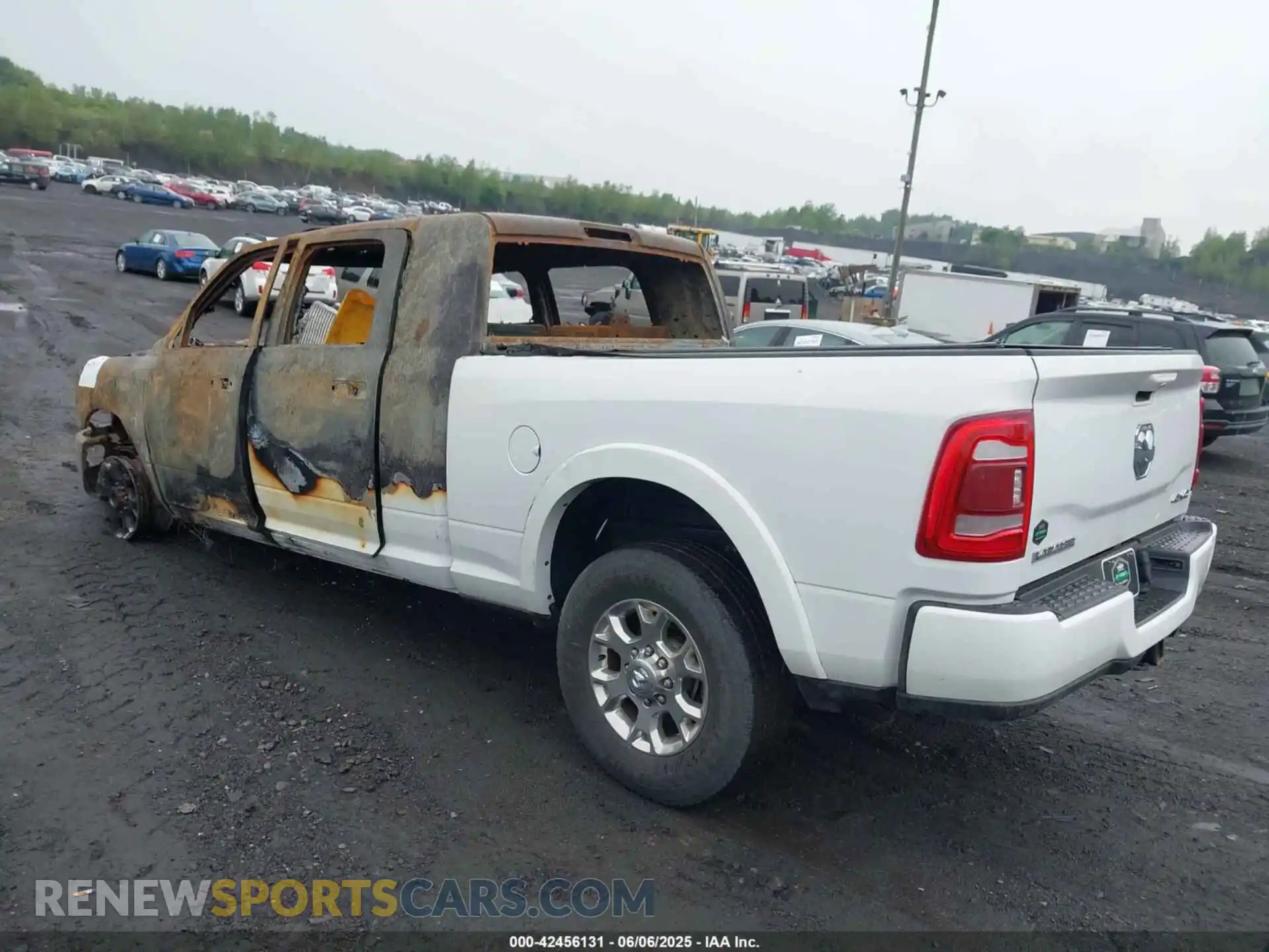 3 Photograph of a damaged car 3C6UR5NL4MG583043 RAM 2500 2021